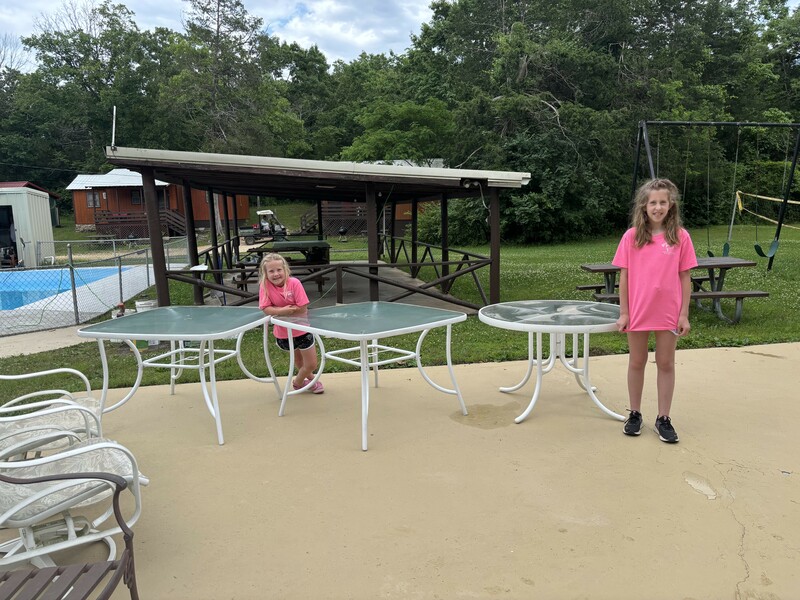 The big pool with slide is open and the furniture is cleaned and ready for you.  