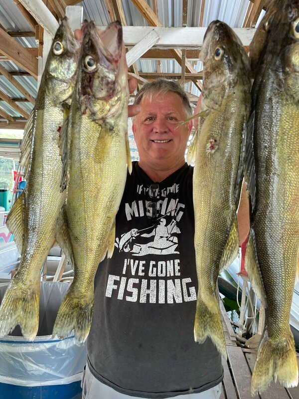 Fisherman Mike with some nice ones Scuba Diving out of Blackburns Resort and Boat Rental on Norfork Lake. 