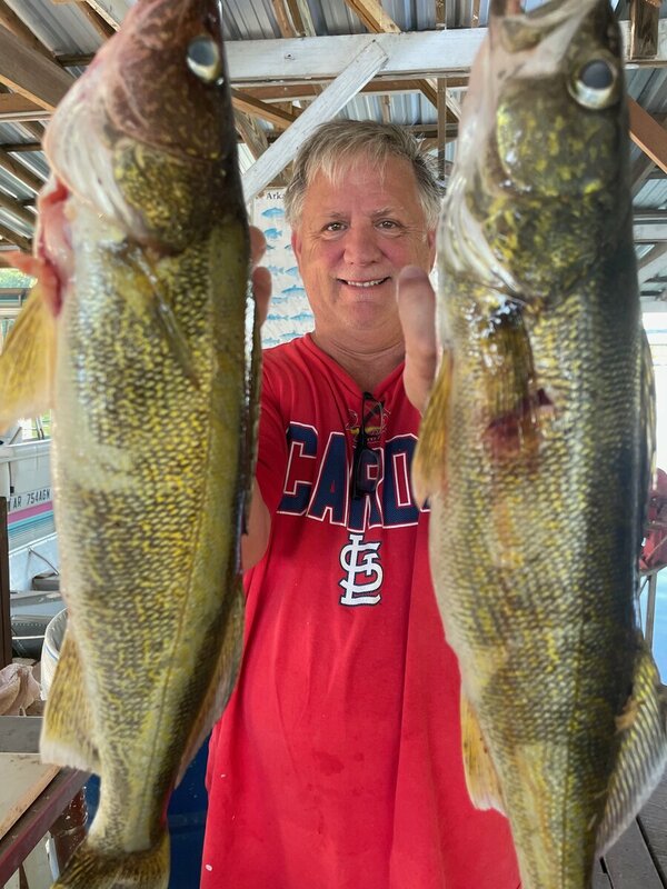 Fisherman Mike with some nice ones Scuba Diving Norfork lake. Blackburns Resort and Boat Rental teams up with Scuba Doo Dive shop to be your Norfork lake Sciba Headquarters. 