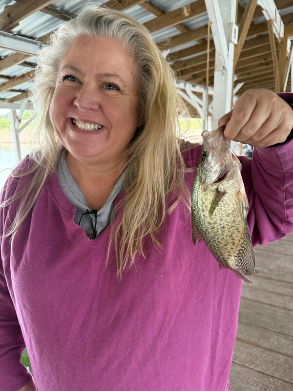 My Daughter Jennifer with a nice one caught and released off Scuba Steve's Dock yesterday.