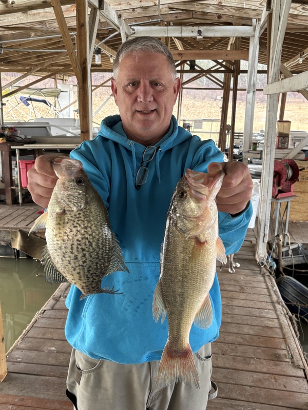 Fisherman Mike with a couple of Nice ones yesterday. Released under the dock. 