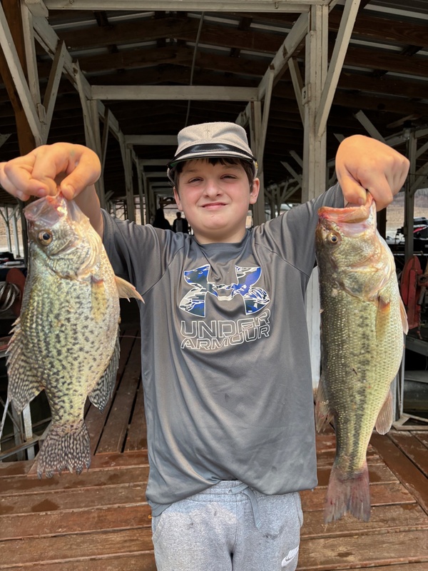 Isaiah McMackins with some nice ones caught and released under Scuba Steve's Dock on Norfork lake. 