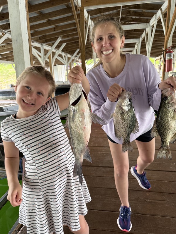 These girls just keep catching fish off Scuba Steve's Dock. 