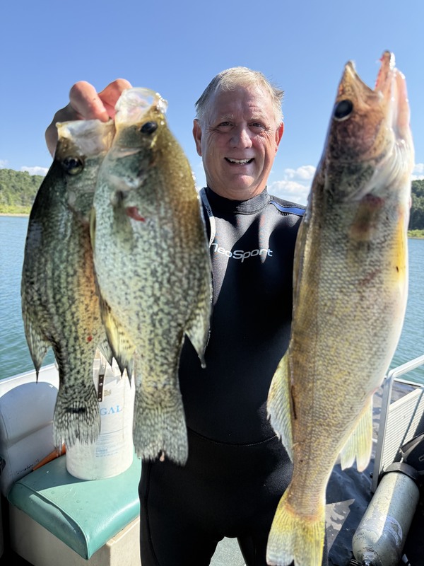 Fisherman Mike with some nice ones. Diving Conditions are Good. 870-492-5115
