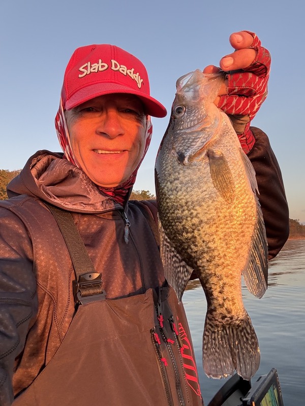 Carl Scott from Texas with a nice Norfork Lake Crappie caught off Scuba Steve's Brush piles. 